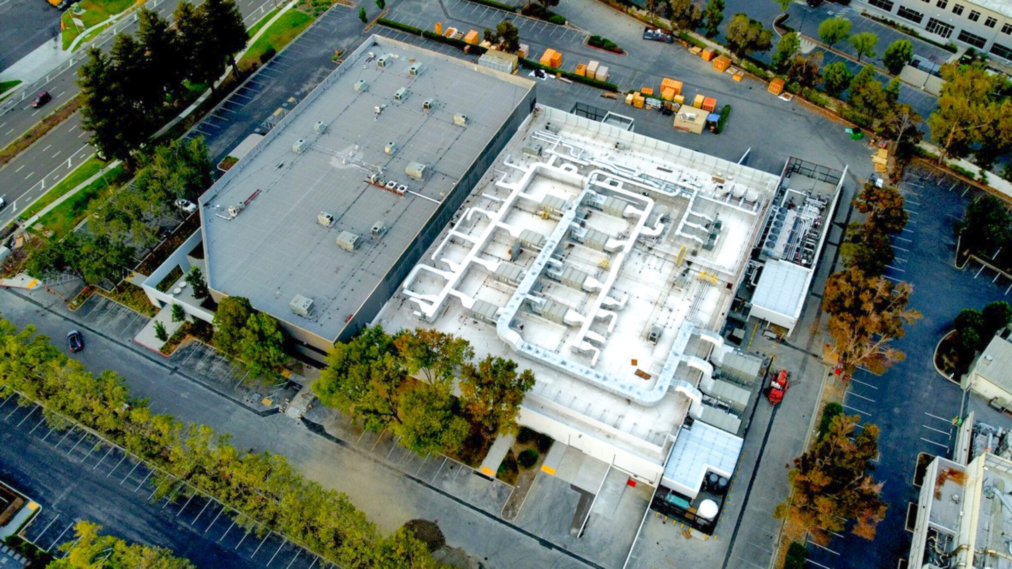 Drone view of rooftop appliances held by structural suppports